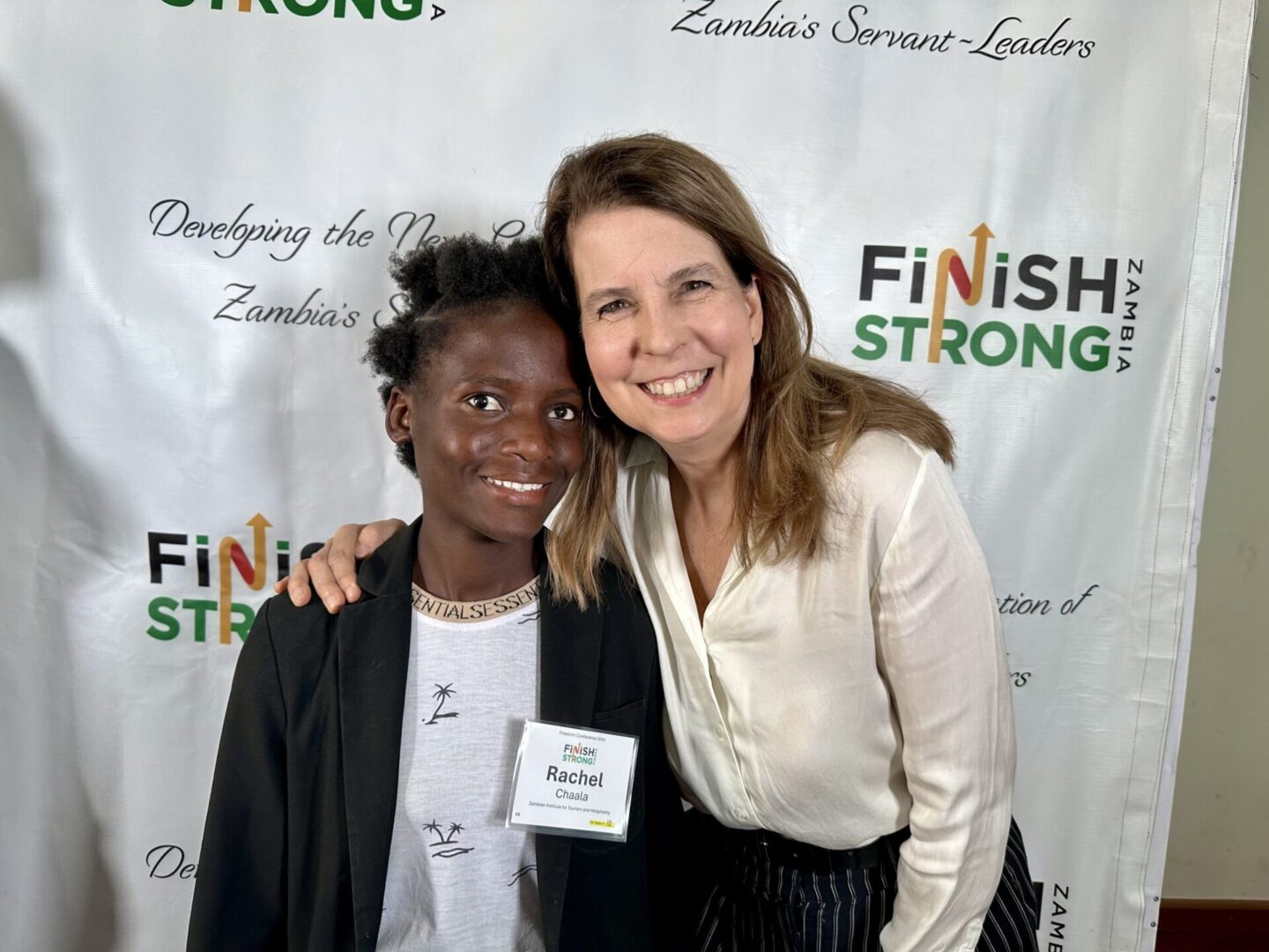 Woman and child at Finish Strong event