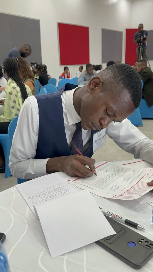 Focused participant filling out form