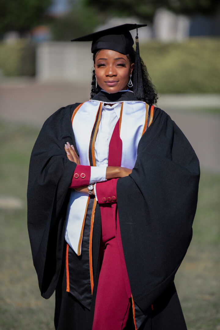 Proud graduate posing on a sunny day